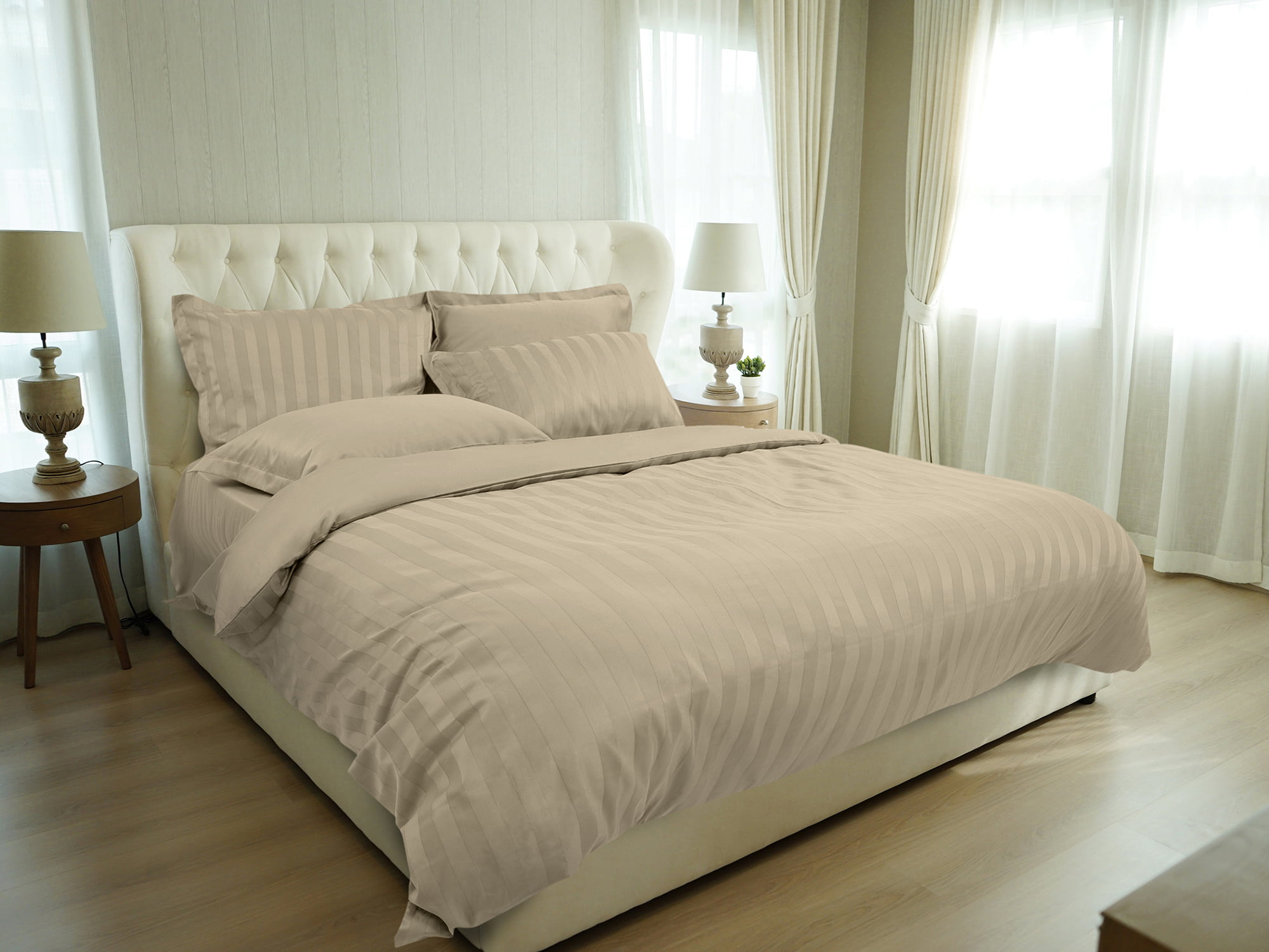 White,Pillows,Setting,On,Bed,With,English,Country,Style,Bedding