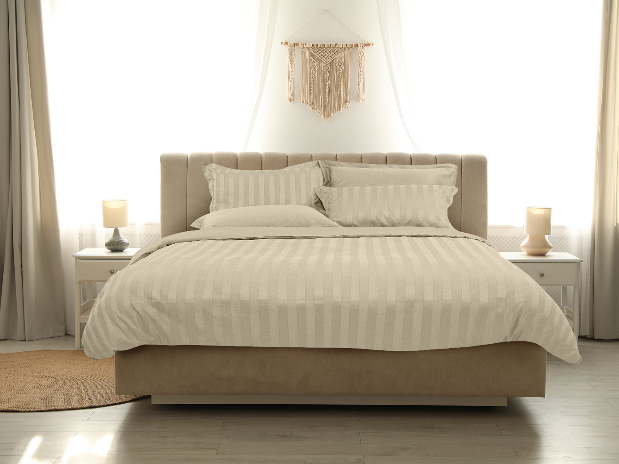 Comfortable bed with soft blanket in stylish room interior