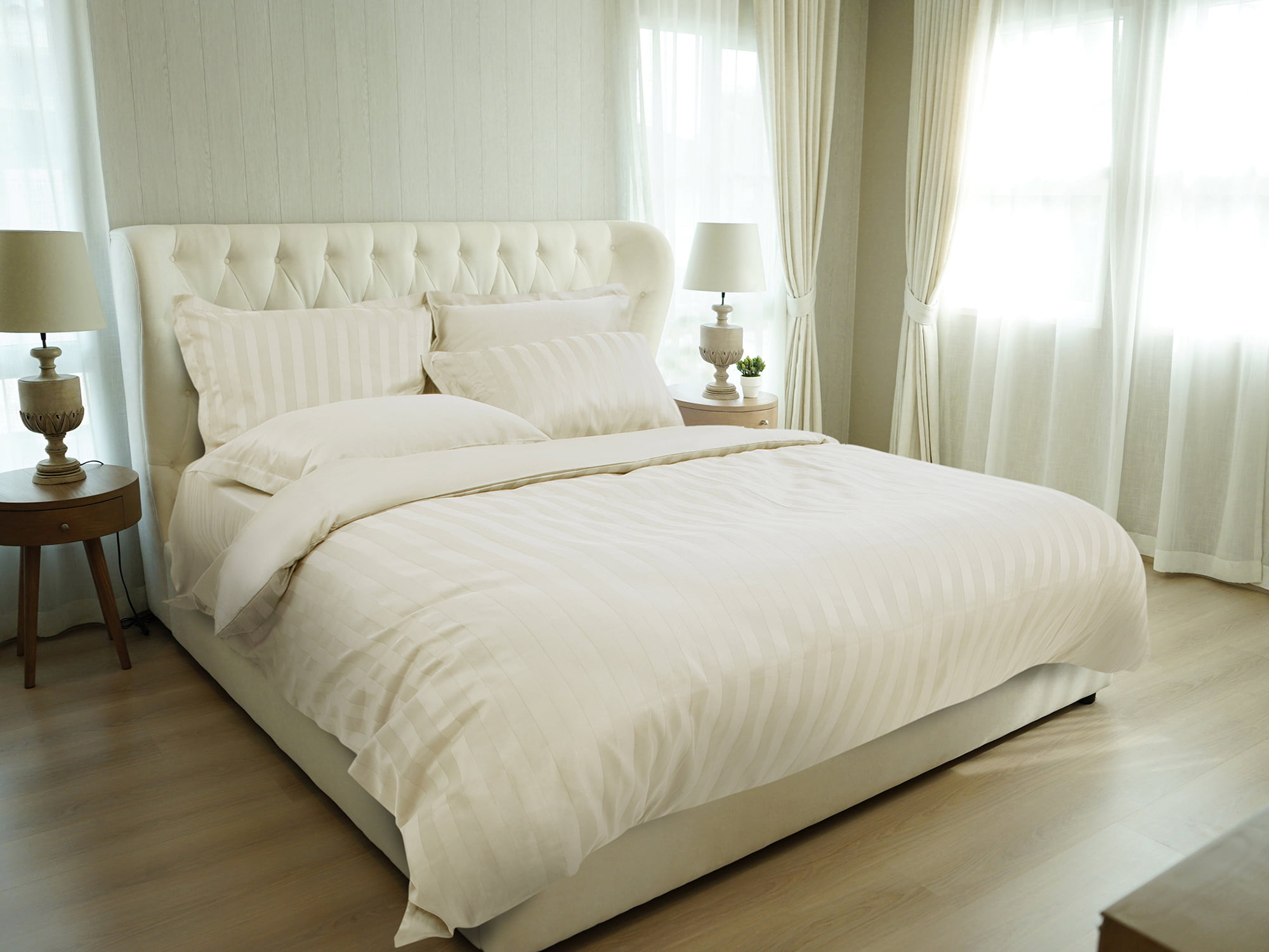 White,Pillows,Setting,On,Bed,With,English,Country,Style,Bedding