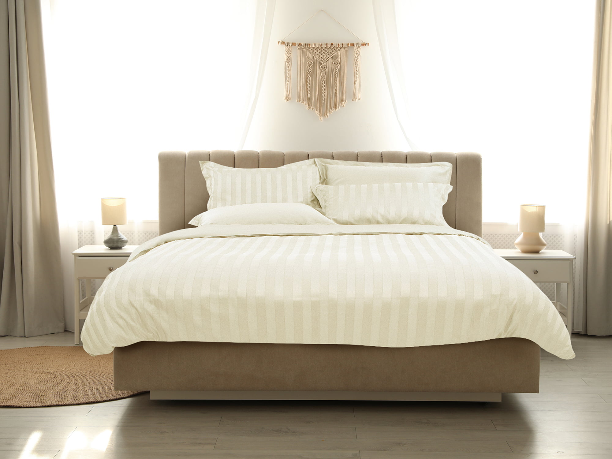 Comfortable bed with soft blanket in stylish room interior